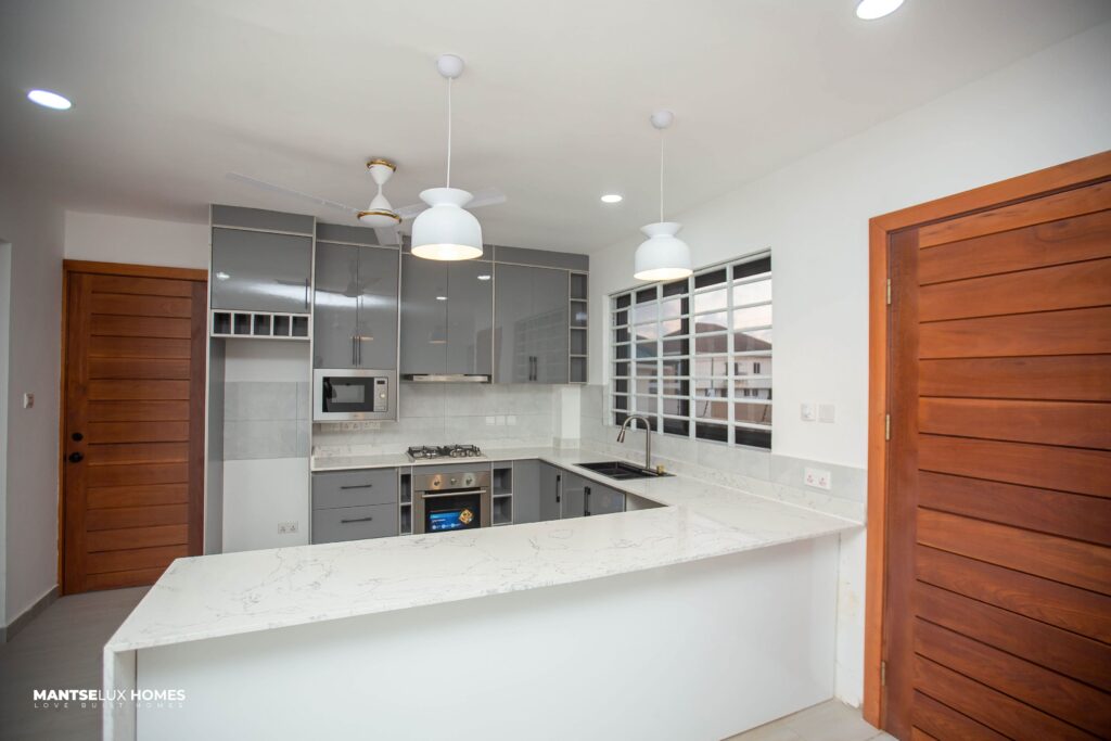 a well lit and spacious kitchen in spintex